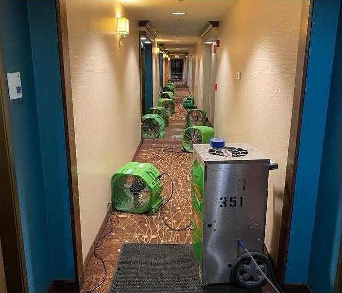 Drying equipment placed on a long hallway of a hotel